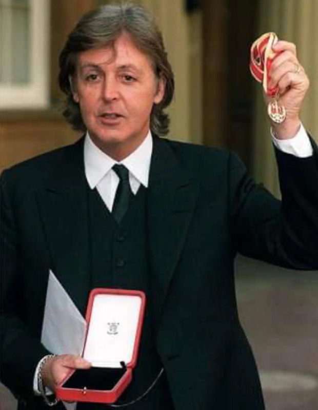 Paul outside Buckingham Palace after receiving his Knighthood on 11th March 1997